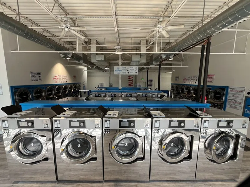 Large capacity washers for comforter cleaning at Sandy Creek Laundromat Colorado Springs